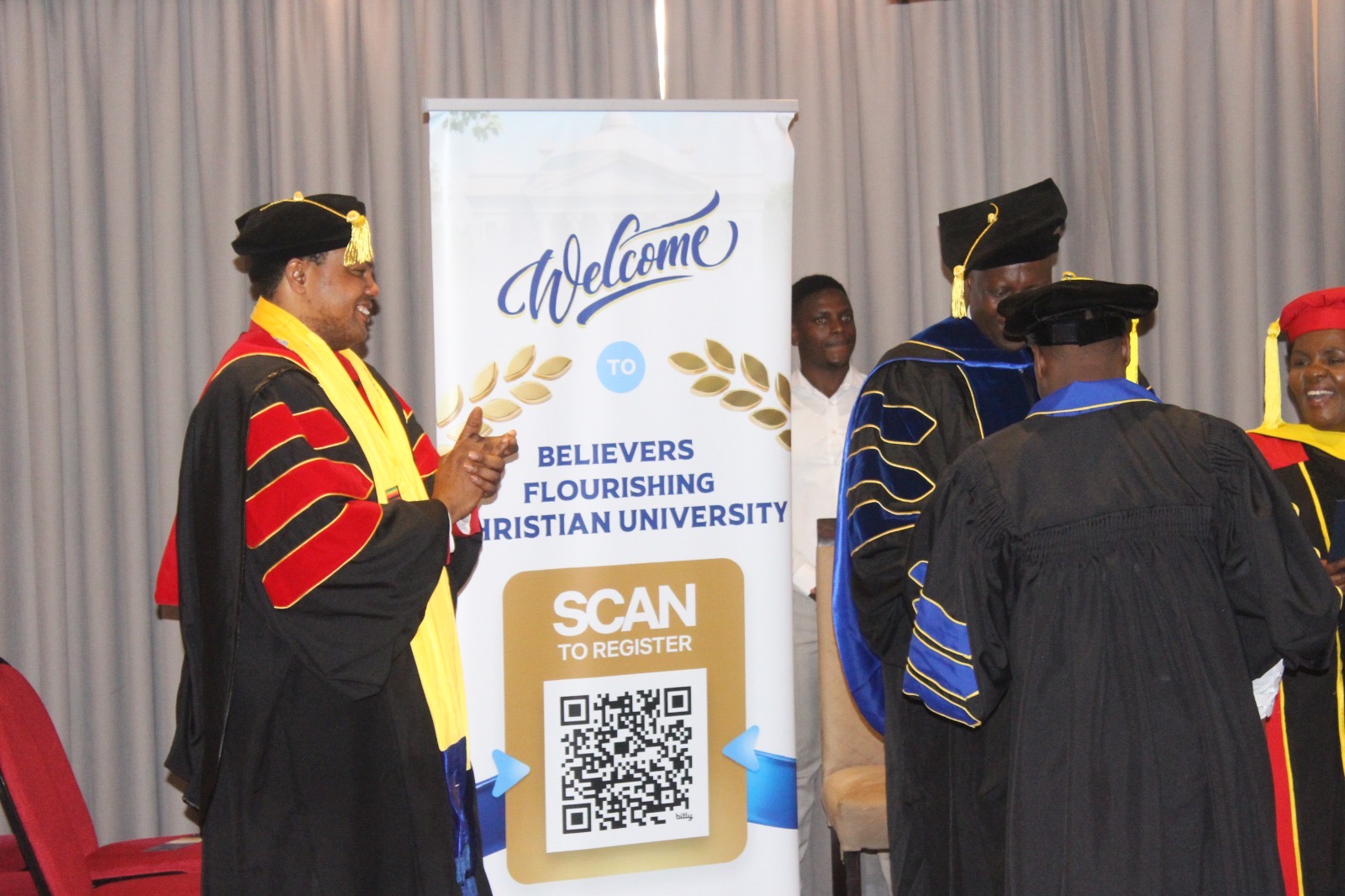 Graduates and faculty group photograph