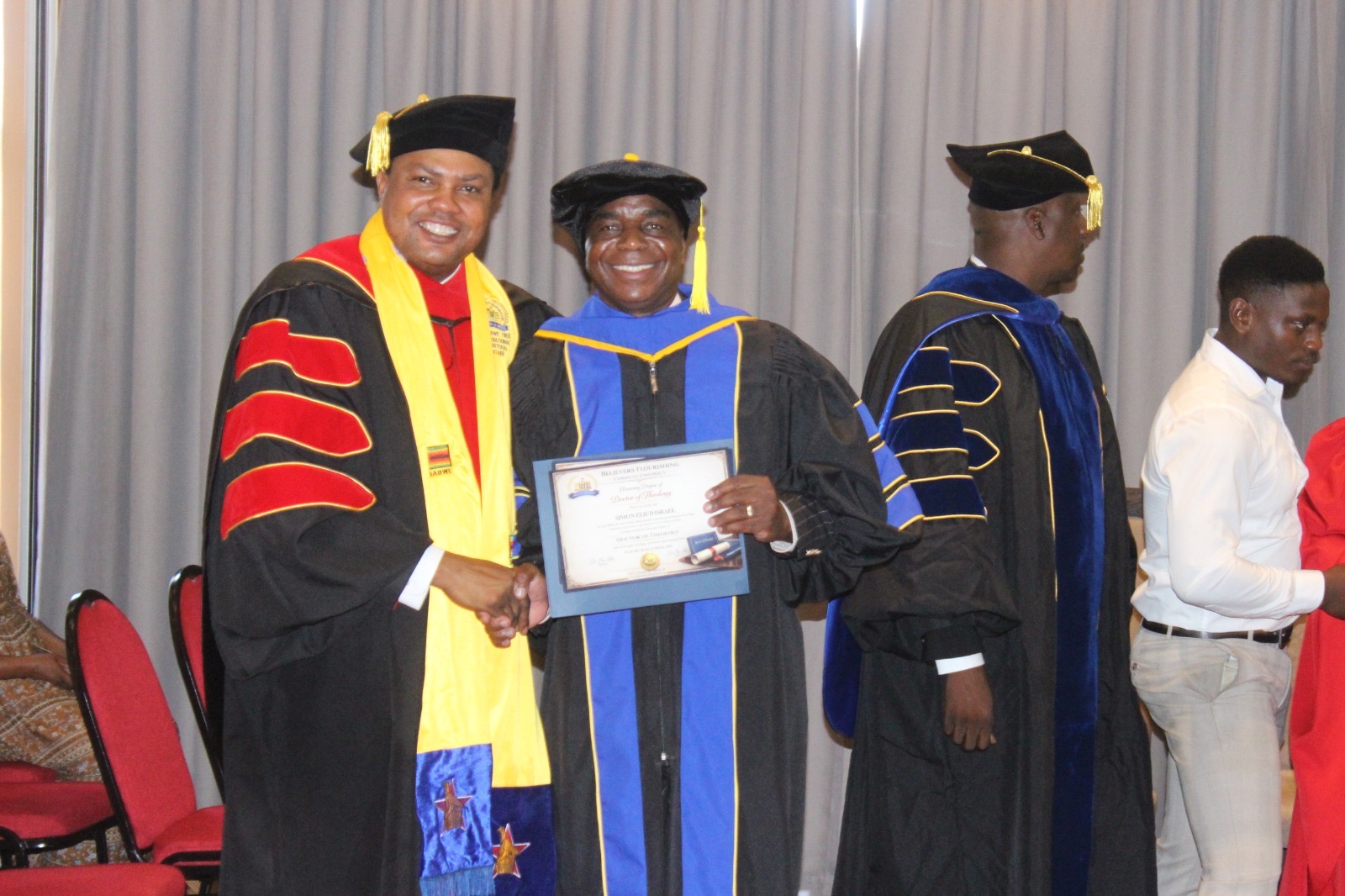 Graduates greeted on stage